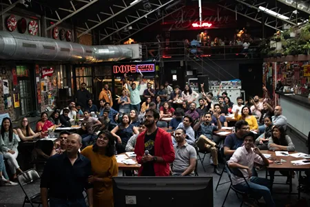 People at an event taking photos